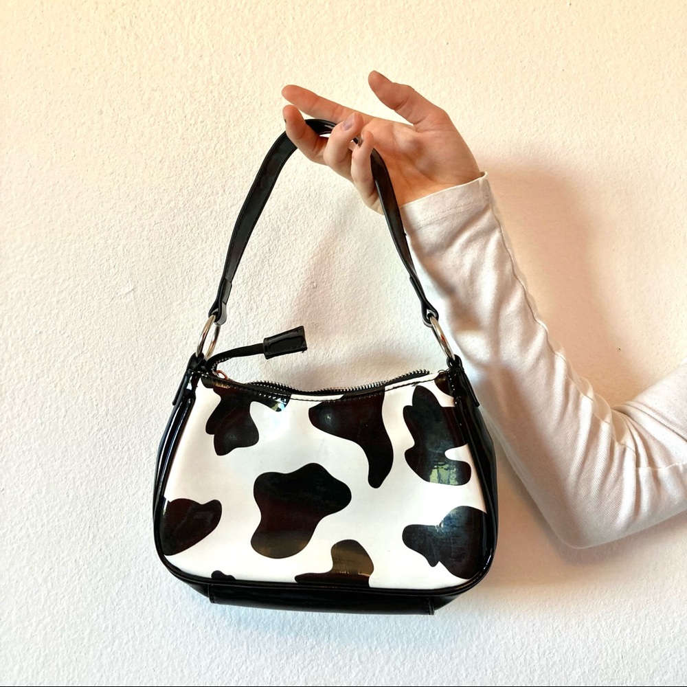 The cow print shoulder bag